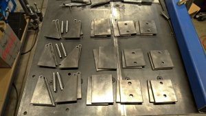 DIY - TIG Welding Cart. 36 cylinder bracket pieces ready to be welded.