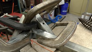 DIY - Workbench. Lots of clamps are required to hold joints straight and true when welding.